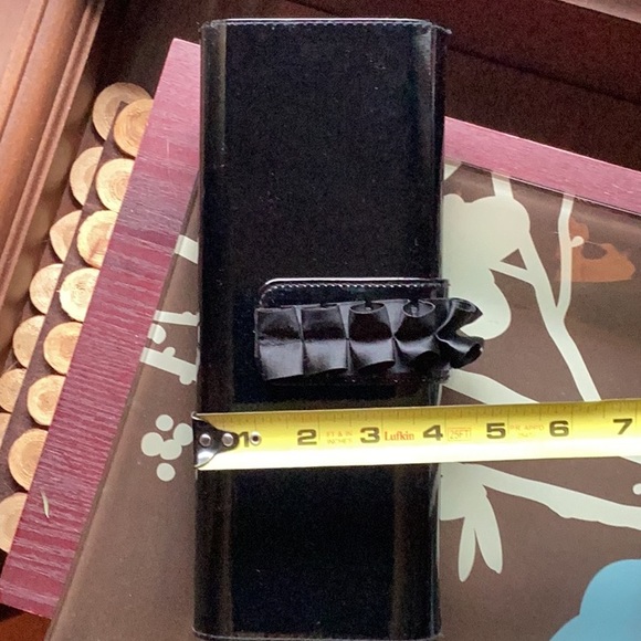 COPY - Black clutch with magnetic ribbon clasp Great used condition small scuff… - Picture 5 of 5